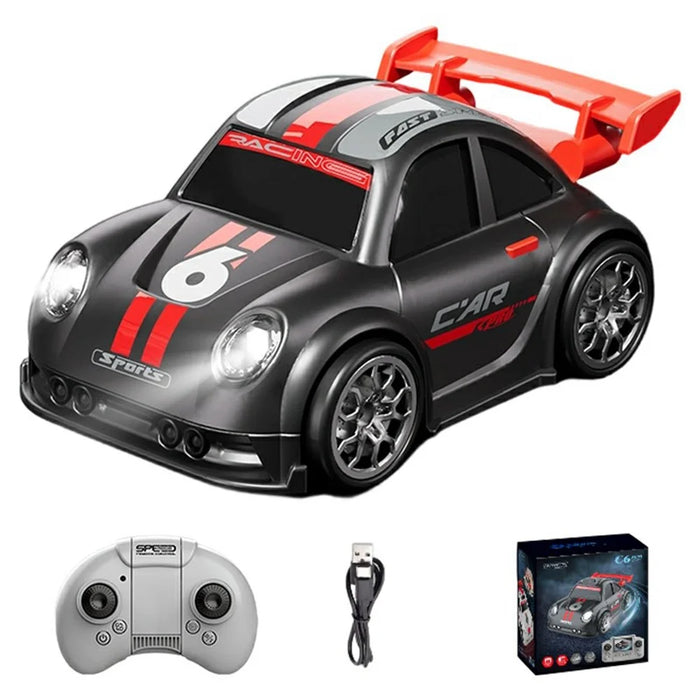 C6 Mini Cartoon RC Car Music Remote Control Electric Vehicle Toy without Camera - Black - 1