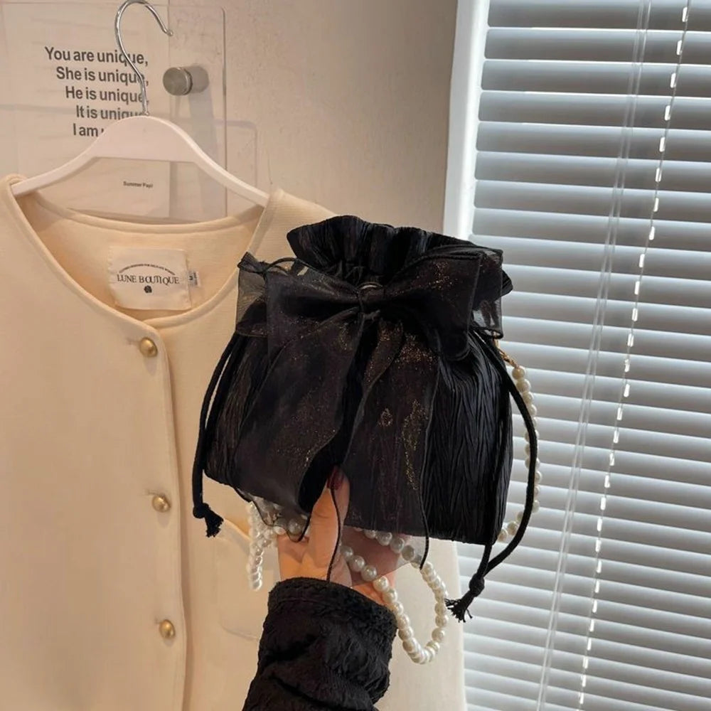 Drawstring Bucket Bag Faux Pearl Chain Shoulder Bag Bow Tie Canvas Crossbody Handbag for Women - Black - 1
