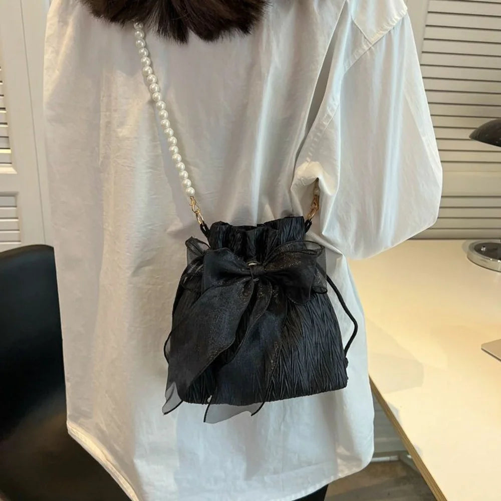 Drawstring Bucket Bag Faux Pearl Chain Shoulder Bag Bow Tie Canvas Crossbody Handbag for Women - Black - 2