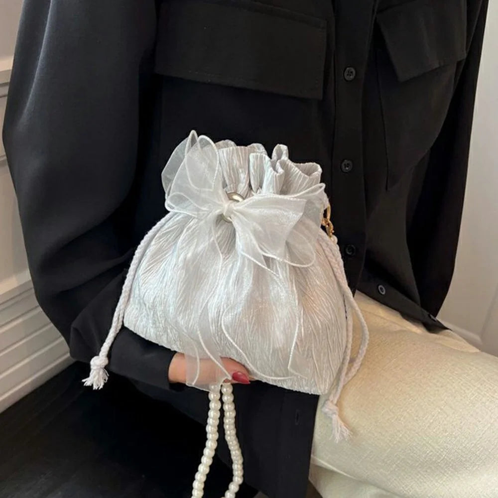 Drawstring Bucket Bag Faux Pearl Chain Shoulder Bag Bow Tie Canvas Crossbody Handbag for Women - Black - 4