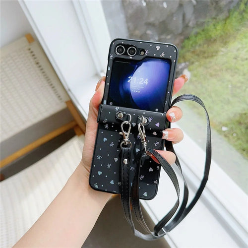 For Samsung Galaxy Z Flip7 FE 5G / Z Flip6 5G / Z Flip5 5G Heart and Bowknot Pattern PU Leather + PC Phone Cover with Crossbody Strap - Black - 1