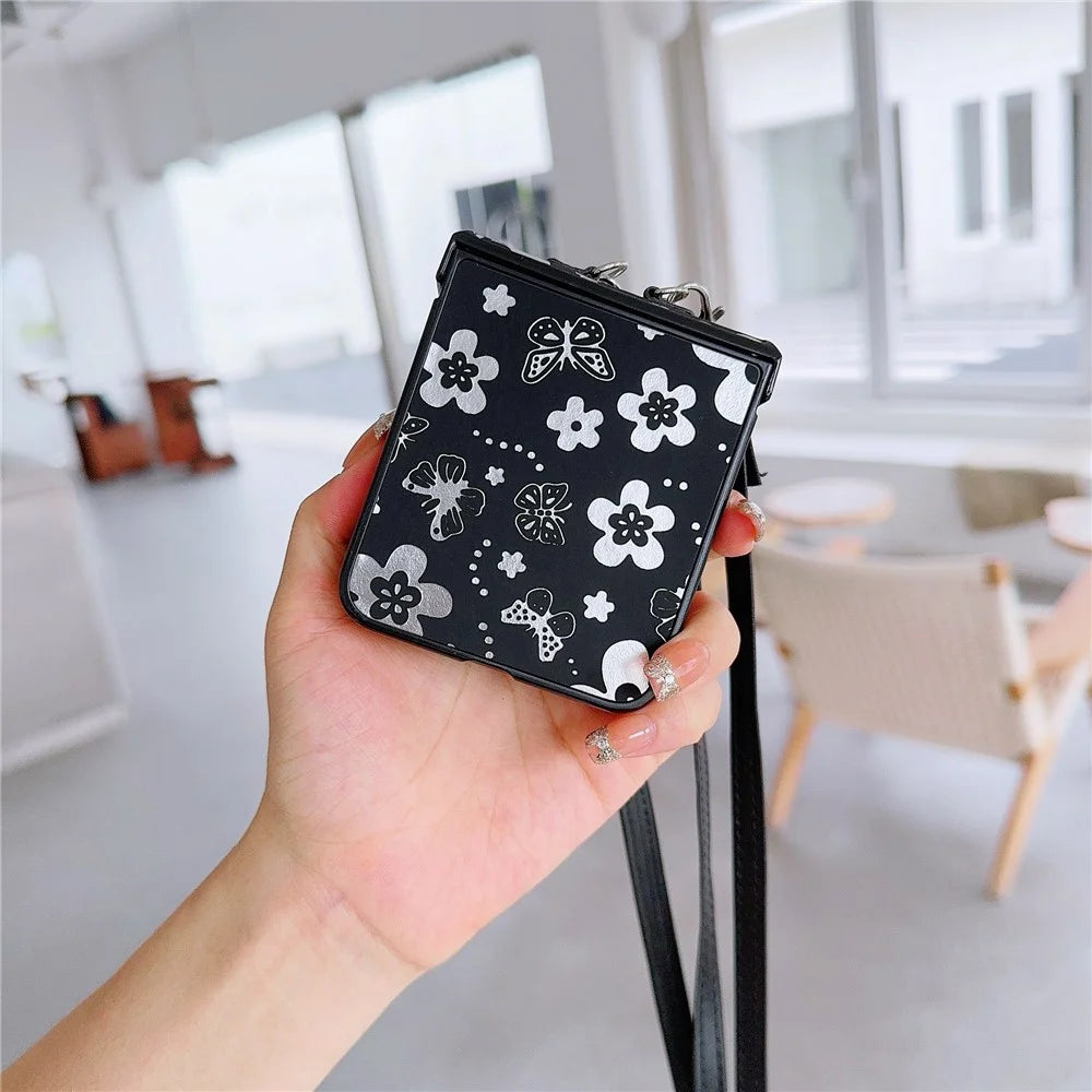 For Samsung Galaxy Z Flip7 FE 5G / Z Flip6 5G Butterfly and Flower Pattern PU Leather Coated PC Phone Cover with Crossbody Strap - Black - 6