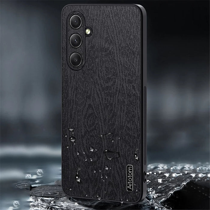 For Samsung Galaxy S24 FE Case Wood Grain PU Leather Coated PC+TPU Phone Cover - Black - 6