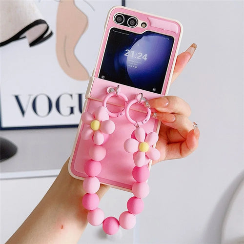 For Samsung Galaxy Z Flip7 FE 5G / Z Flip6 5G Case Skin-Touch Leather+PC Phone Cover with Beaded Wrist Strap - Pink - 1