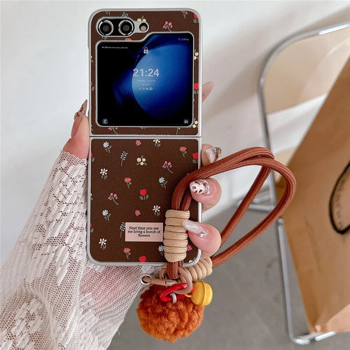 For Samsung Galaxy Z Flip7 FE 5G / Z Flip6 5G Case Leather+PC Floral Phone Cover with Hand Strap - Brown - 1