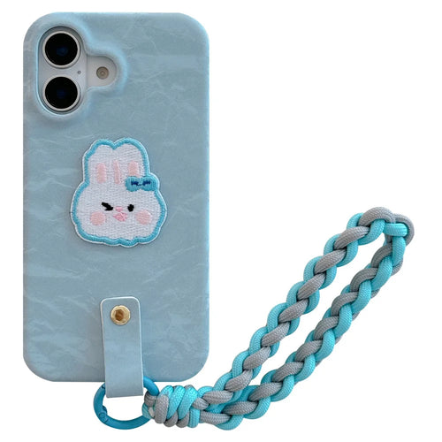 For iPhone 16 Case Cute Pattern Soft PU+PC Phone Back Cover with Braided Handy Strap - Sky Blue Rabbit - 1
