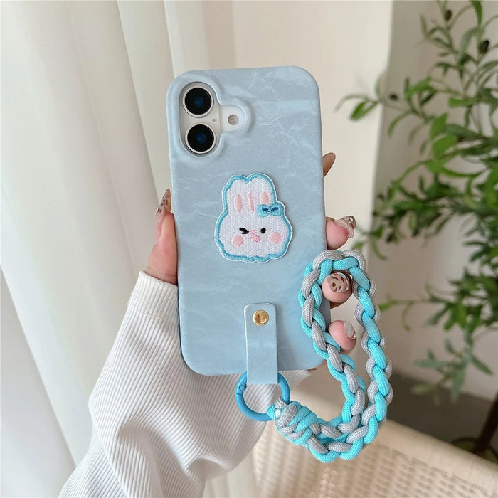 For iPhone 16 Case Cute Pattern Soft PU+PC Phone Back Cover with Braided Handy Strap - Sky Blue Rabbit - 2