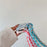 For iPhone 16 Case Cute Pattern Soft PU+PC Phone Back Cover with Braided Handy Strap - Sky Blue Rabbit - 5