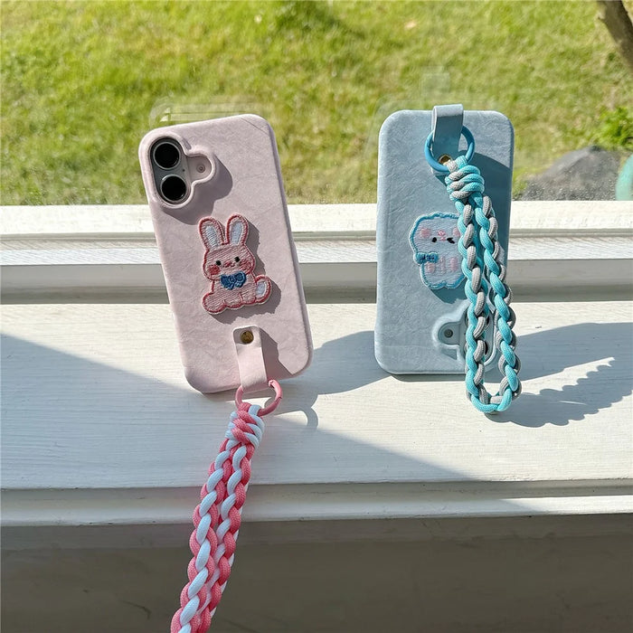 For iPhone 16 Case Cute Pattern Soft PU+PC Phone Back Cover with Braided Handy Strap - Sky Blue Rabbit - 6