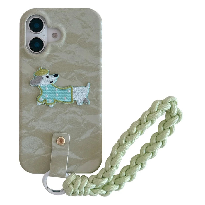For iPhone 16 Plus Case Cute Pattern Soft PU+PC Phone Back Cover with Braided Handy Strap - Lihgt Green Dog - 1