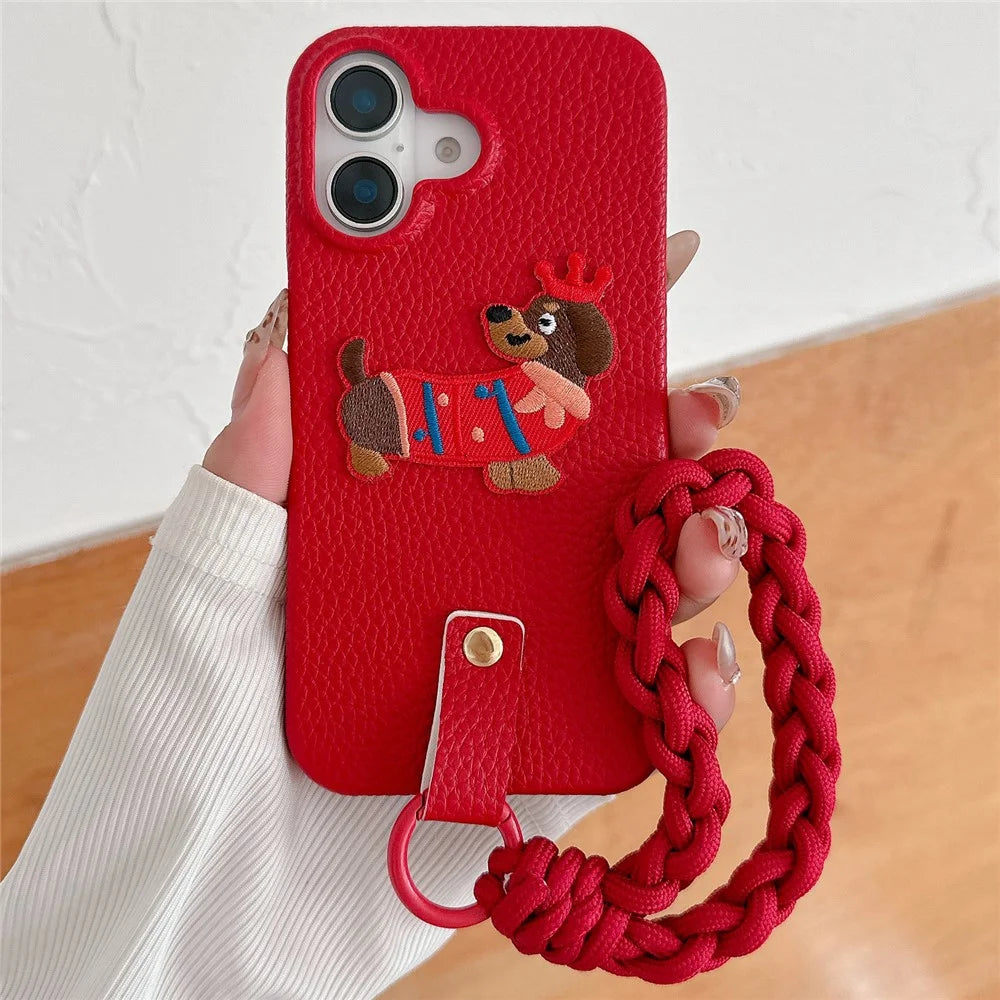 For iPhone 16 Case Christmas Design Cute Dog Pattern PU+PC Phone Back Cover with Braided Handy Strap - 1