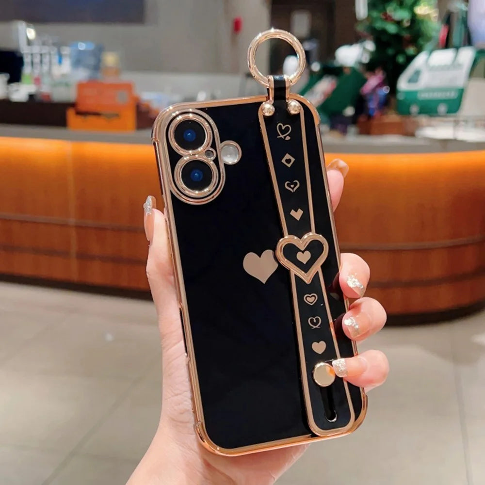 For iPhone 16 Case Wristband Kickstand Love Heart TPU Phone Cover Finger Holder - Black - 1