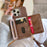 For iPhone 14 Pro Case Card Slots Mirror Design Jeans Cloth Texture PU Leather Back Cover with Strap - Light Brown - 6