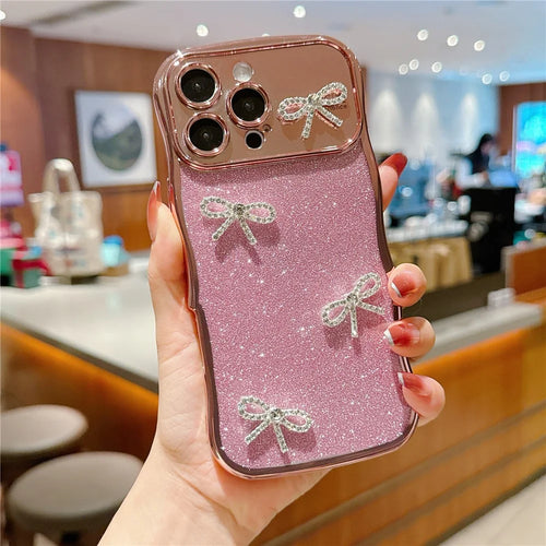 For iPhone 16 Pro Case Electroplated Wavy Frame Glitter TPU Phone Cover with Rhinestone Bow Decor - Rose Pink - 1