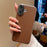 For iPhone 16 Case Electroplating Edge Litchi Texture Leather + PC Phone Cover - Dark Coffee - 1