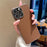 For iPhone 16 Pro Case Electroplating Edge Litchi Texture Leather + PC Phone Cover - Dark Coffee - 1