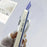 For iPhone 16 Case Skin-Touch TPU + PC Clear Phone Back Cover with Wrist Strap - Antique White - 3