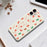 For iPhone 17 Case Red Green Socks and Canes Pattern Printing Straight Edge TPU Phone Back Cover - Beige - 6