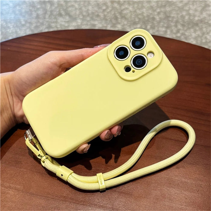 For iPhone 16 Pro Case Precise Cutouts Liquid Silicone + PC Phone Cover with Wrist Strap - Light Yellow - 2