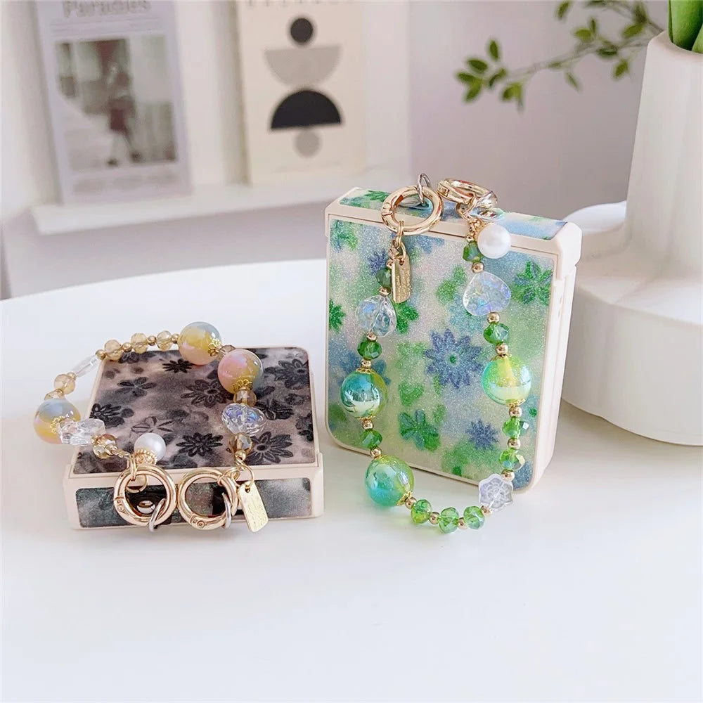 For Samsung Galaxy Z Flip7 5G Case Glitter Flower TPU + PC Phone Cover with Beaded Wrist Strap - Green - 7