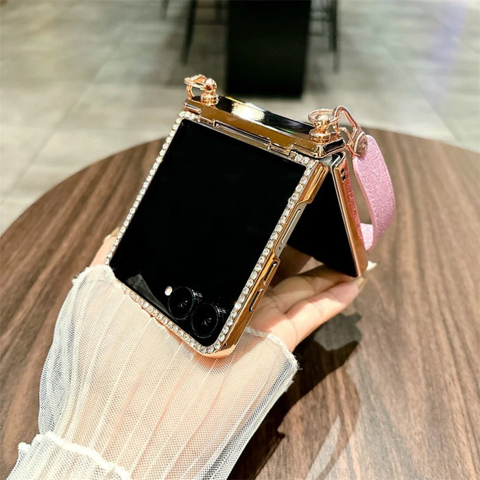 For Samsung Galaxy Z Flip7 5G Case Electroplated Edge Rhinestone Glitter PC Phone Cover with Hand Strap - Rose Gold - 7