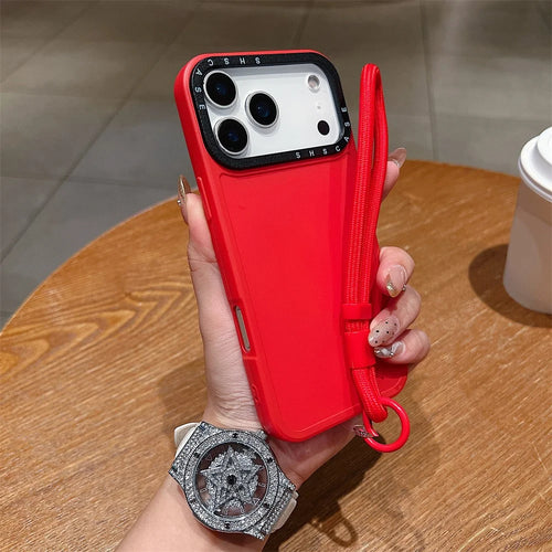 For iPhone 18 Pro / 17 Pro Case Black Lens Frame Shockproof TPU PC Phone Back Cover with Wrist Strap - Red - 1
