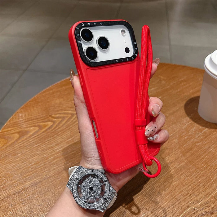 For iPhone 18 Pro / 17 Pro Case Black Lens Frame Shockproof TPU PC Phone Back Cover with Wrist Strap - Red - 1