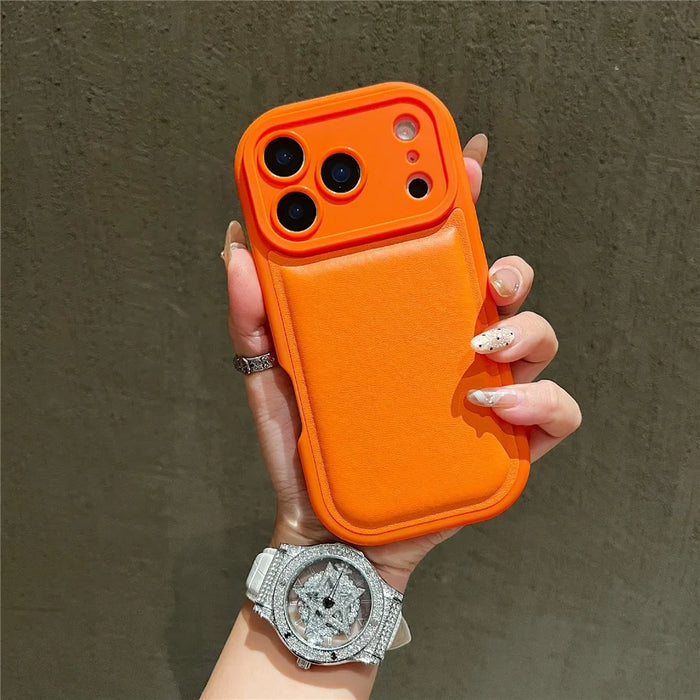 For iPhone 17 Pro Case Round Hole Shockproof PU + TPU Phone Back Cover - Orange - 1