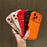 For iPhone 17 Pro Case Round Hole Shockproof PU + TPU Phone Back Cover - Orange - 4