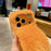 For iPhone 17 Pro Max Solid Color Fluffy Phone Case Winter Warm Hand Strap TPU Cover - Orange - 3