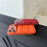 For iPhone 17 Pro Case Down Jacket Design Skin-touch PU Leather Coated PC + TPU Phone Cover - Orange - 6