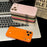 For iPhone 17 Pro Case TPU + Tempered Glass Phone Cover with Acrylic Lens Protector - Orange - 2