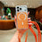 For iPhone 18 Pro Max / 17 Pro Max Case Compatible with MagSafe Clear Glitter TPU Acrylic Phone Cover with Shoulder Strap - Orange - 1
