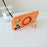 For iPhone 17 Pro Max Magnetic Case Rotating Ring Kickstand PC + TPU Skin-touch Phone Cover - Transparent Orange - 3