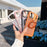 For iPhone 17 Pro Max Magnetic Case Rotating Ring Kickstand PC + TPU Skin-touch Phone Cover - Transparent Orange - 6