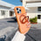 For iPhone 16 Pro Max Magnetic Case Rotating Ring Kickstand PC + TPU Skin-touch Phone Cover - Transparent Orange - 1