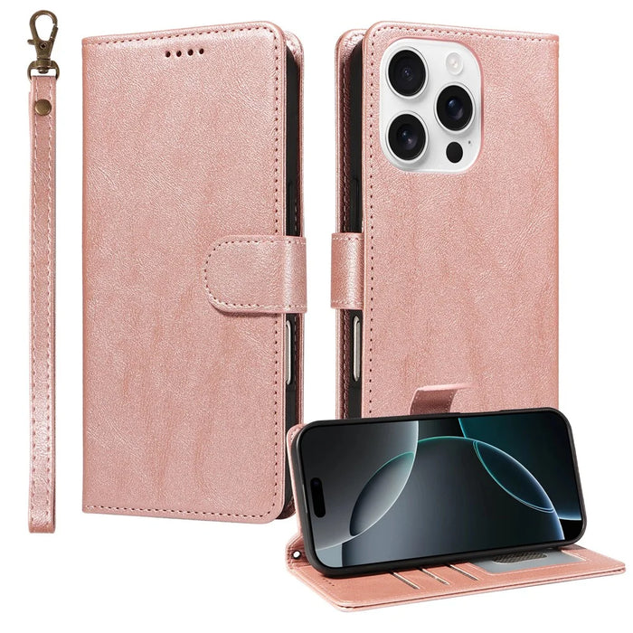For iPhone 16 Pro Case with Wrist Strap RFID Blocking Wallet Cowhide Texture Leather Phone Cover - Rose Gold - 1