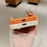 For iPhone 17 Pro Case Litchi Texture Genuine Cow Leather Coated TPU + PC Protective Cover - Orange Shell / Orange+Black - 7