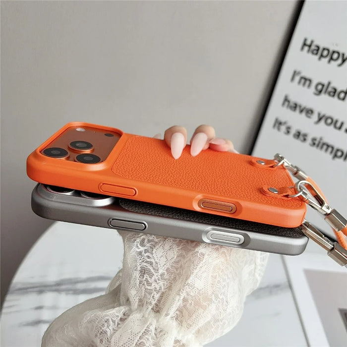 For iPhone 17 Pro Case Metal Paint Litchi Texture PU Leather Phone Back Cover with Wrist Strap - Orange - 3