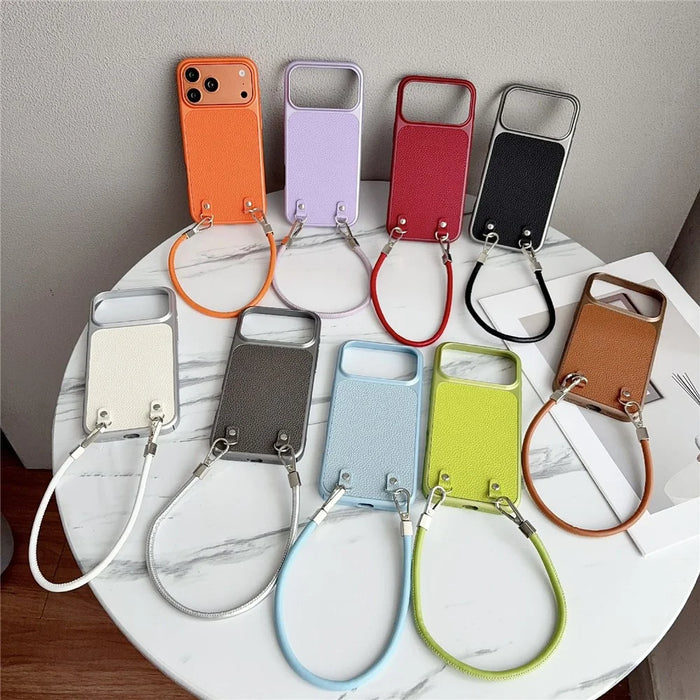 For iPhone 17 Pro Case Metal Paint Litchi Texture PU Leather Phone Back Cover with Wrist Strap - Orange - 7
