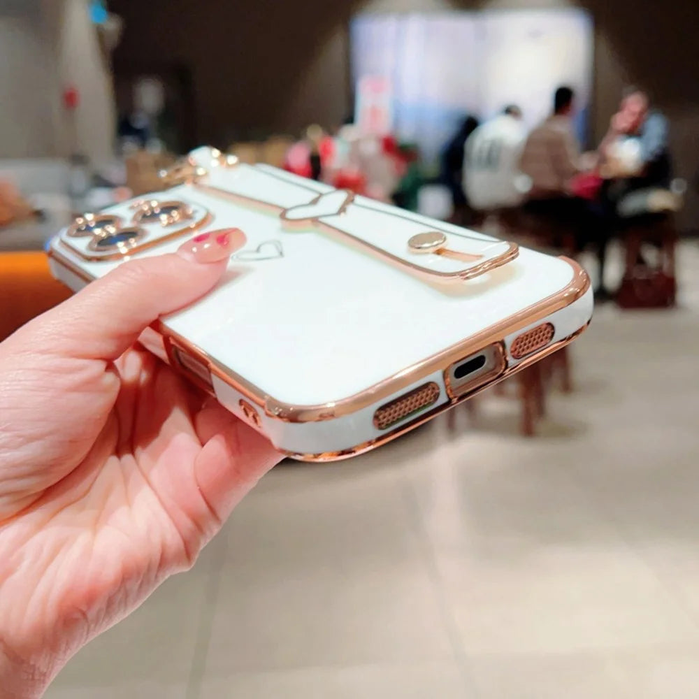 For iPhone 16 Pro Case Electroplated Heart Pattern TPU Phone Back Cover with Wristband Kickstand - Ivory White - 4