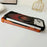 For iPhone 17 Pro Case Rotating Magnetic Kickstand Carbon Fiber Texture PC + Metal Shockproof Phone Cover - Orange - 4