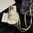 For iPhone 14 Pro TPU Cover Leather Small Schoolbag Design Phone Case with Crossbody Strap - White - 1