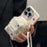 For iPhone 14 Pro TPU Cover Leather Small Schoolbag Design Phone Case with Crossbody Strap - White - 2