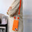 For iPhone 15 Plus Liquid Silicone Phone Case Card Slot Protective Cover with Strap - Orange - 2
