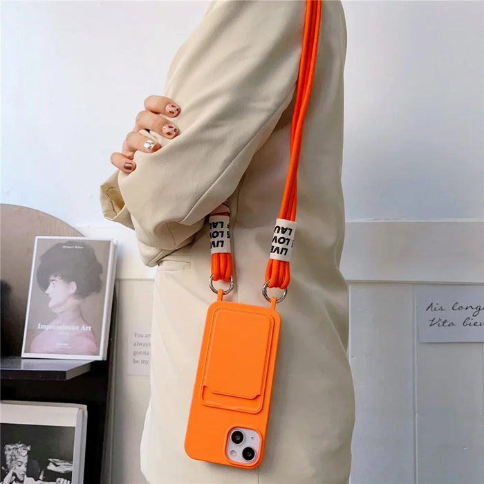 For iPhone 15 Plus Liquid Silicone Phone Case Card Slot Protective Cover with Strap - Orange - 2