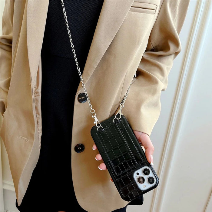 For iPhone 15 Shockproof Case Crocodile Textured PU+PC Phone Cover 2 Card Slots Anti-Drop Phone Shell with Strap - Black - 6