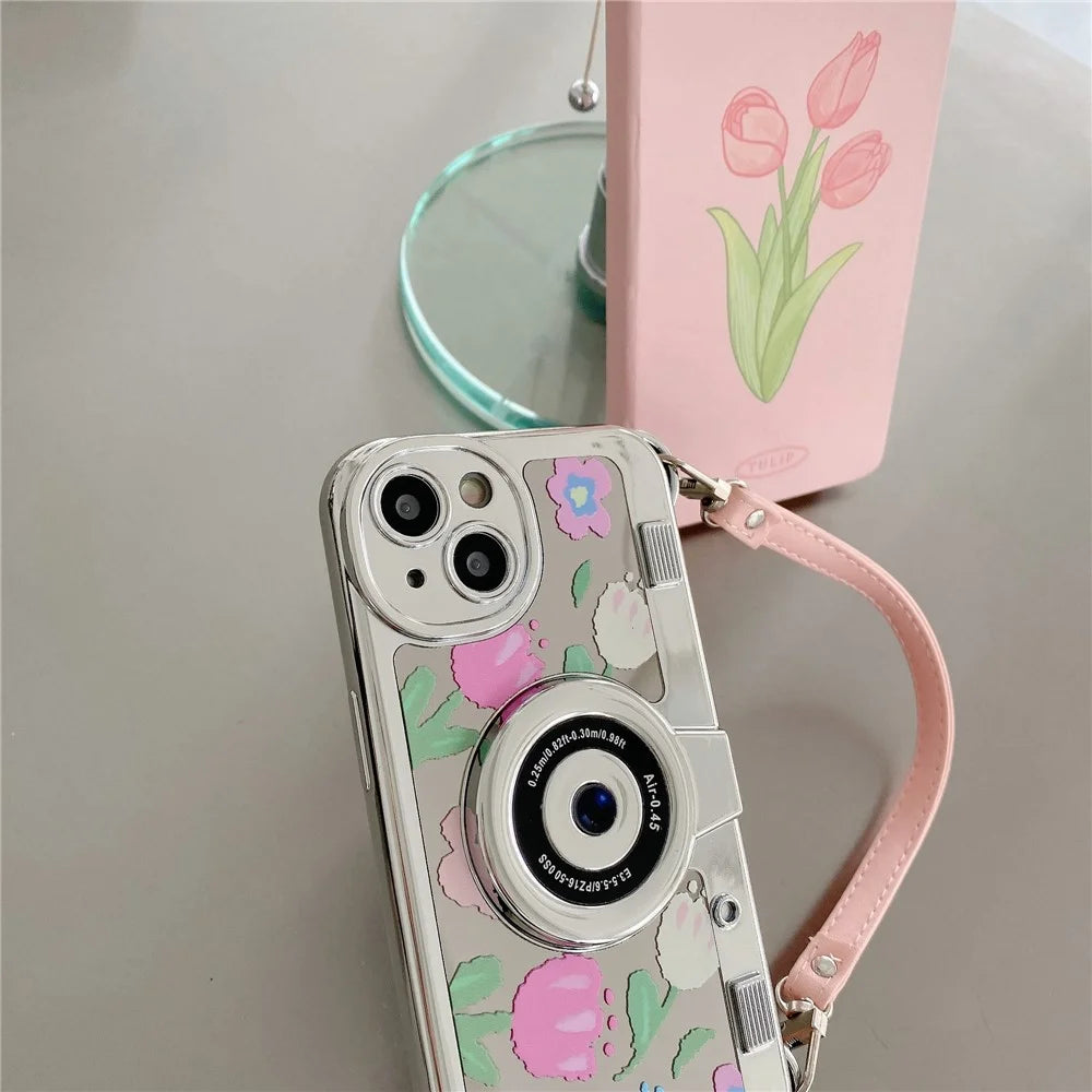 For iPhone 13 Camera Shaped TPU Cover Mirror Surface Electroplating Phone Cases with Handy Strap - Pink Flower - 4