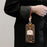 For iPhone 15 Pro Case Cute Bear Down Jacket Design Leather+TPU Phone Cover with Wrist Strap - White - 6