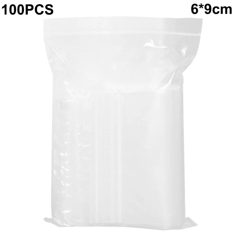 MX-054 100Pcs / Pack 6 x 9cm Small Clear Sealing Bags Kitchen Resealable Ziplock PE Storage Pouches - 1